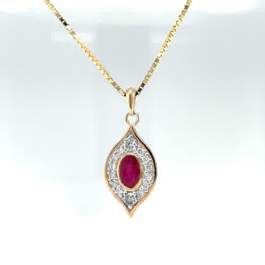 14k yellow gold Oval Pendant with 0.72ct Oval Ruby and 0.26cttw of diamonds