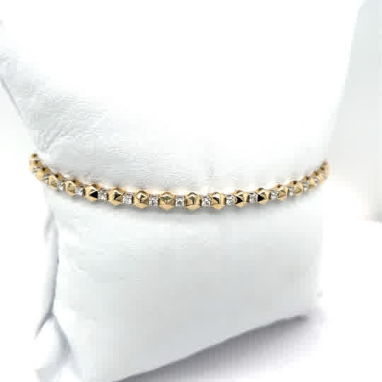14k yellow gold flexible bangle  bracelet with .27ct TWT natural diamonds